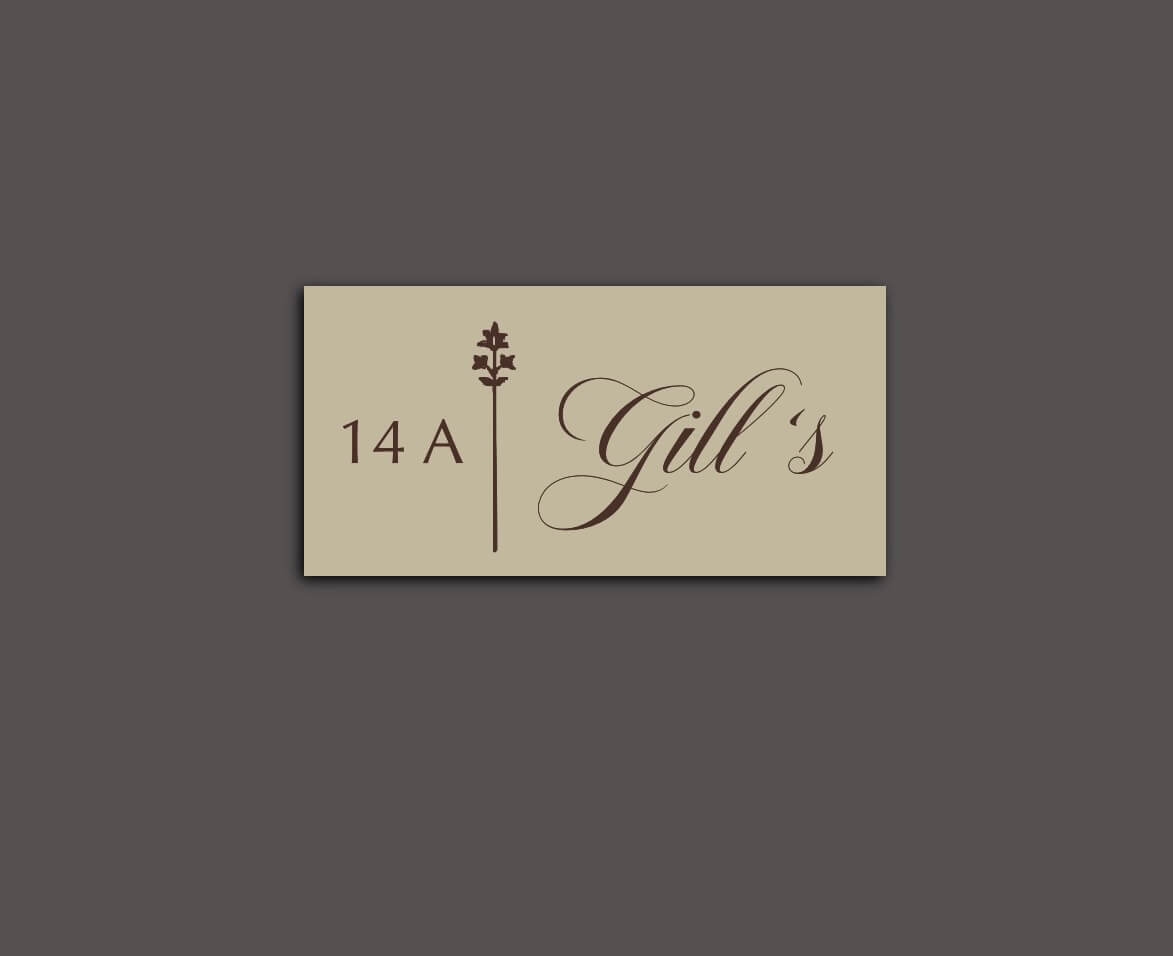 Caim 2 – Laser-Cut Name Plate with Golden Motif on Cream Steel Base